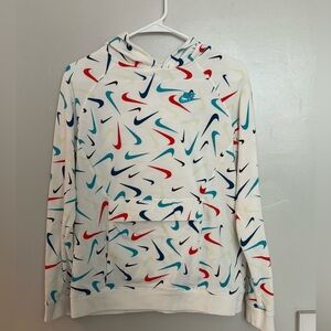 Boys white Nike pullover hoodie. Size XL. Multicolor swoosh print.
